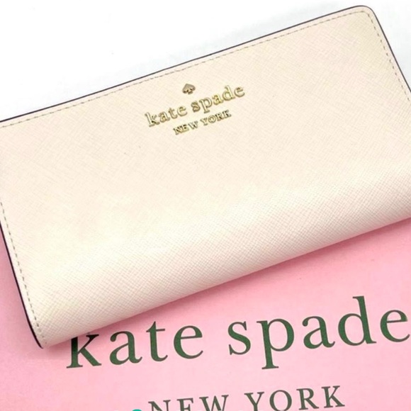 kate spade Handbags - Kate Spade Staci Large Slim Bifold Wallet Parchment White